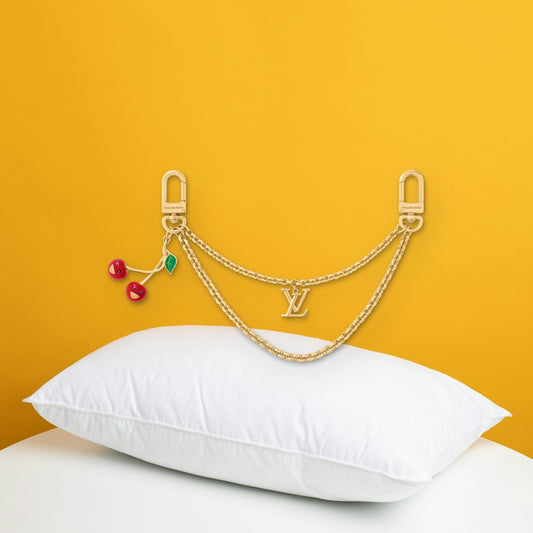 Cerise Bag Chain - In-Hand Scale View | Eluxsic Luxury Charm