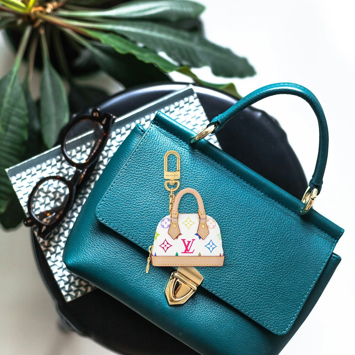 Micro Alma Bag Charm - On-Bag Drape View | Eluxsic Luxury Charm